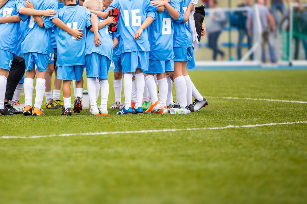 club_background_image/c0306a1c-5235-4289-bfdd-8c4c5a5a7f12-football-huddle.jpg